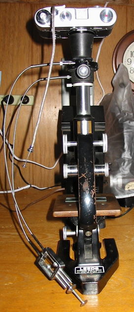 The apparatus fitted to a worn but serviceable stand.