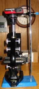 Vertical microscope with ring supported digital camera.